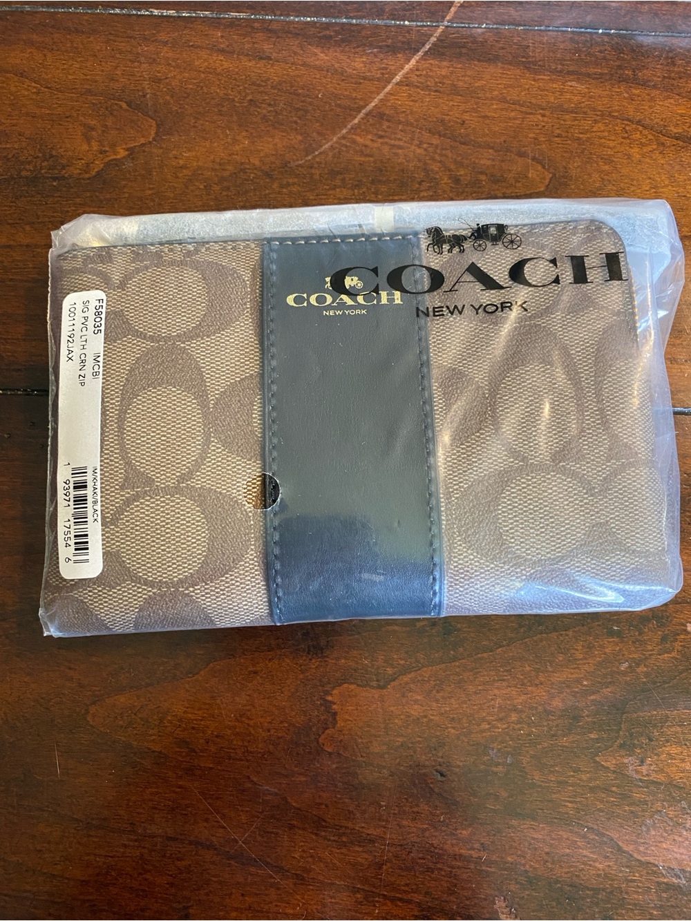 Coach Signature Wristlet in Brown with Black Trim